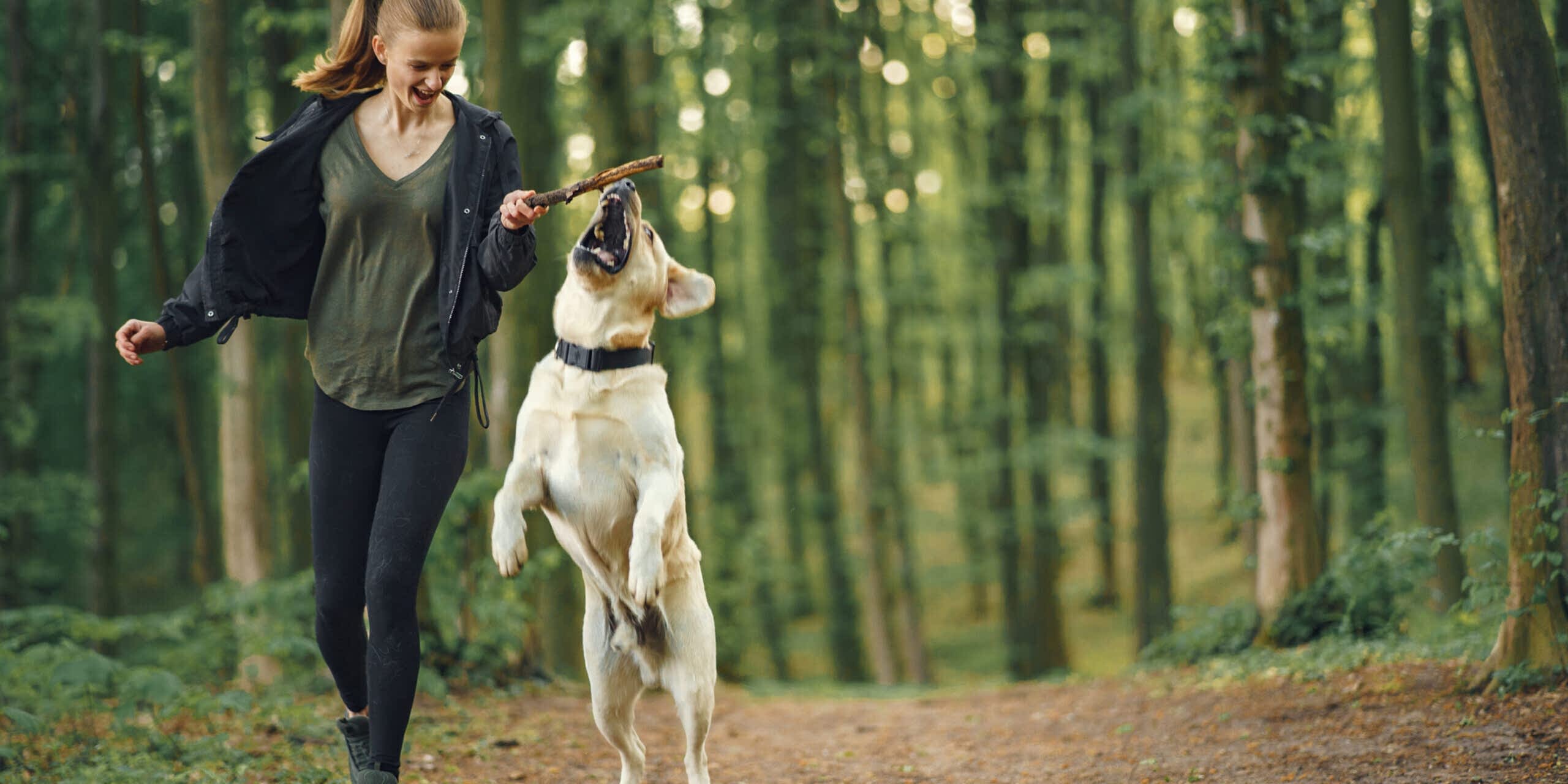 Portrait of a woman with her beautiful dog